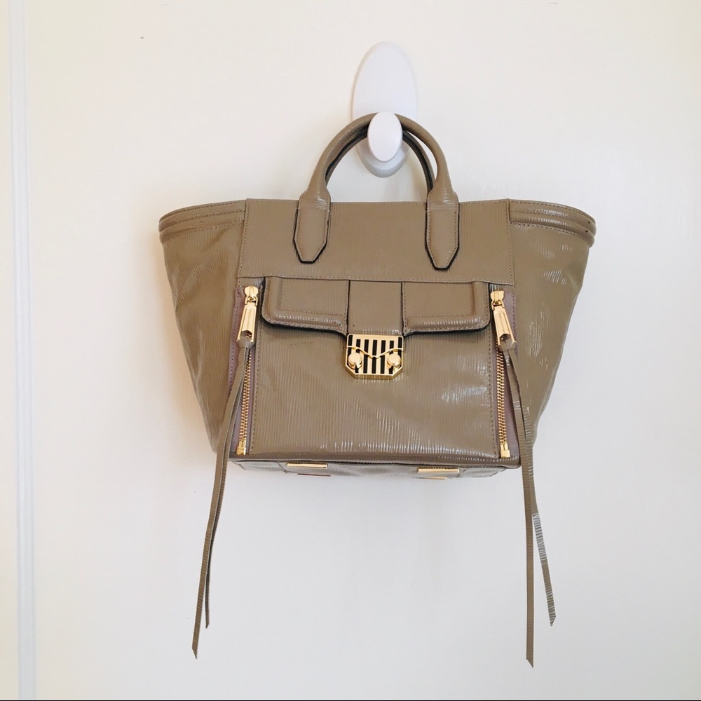 Rebecca Minkoff Tan Patent Leather Satchel Bag (rare!)
9” X 10” X 5.5” W